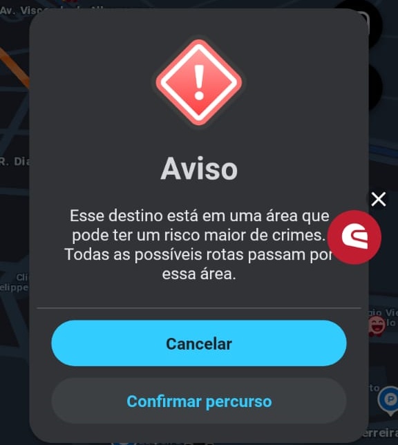 Print do aplicativo Waze mostrando alerta de segurança: "Esse destino está em uma área que pode ter um risco maior de crimes. Todas as possíveis rotas passam por essa área